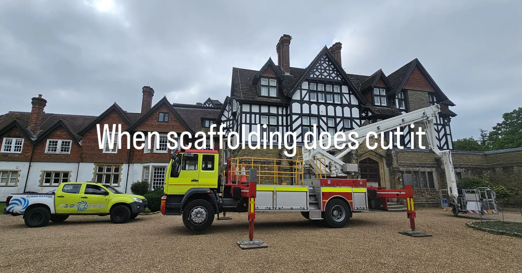 A yellow truck is parked in front of a house.